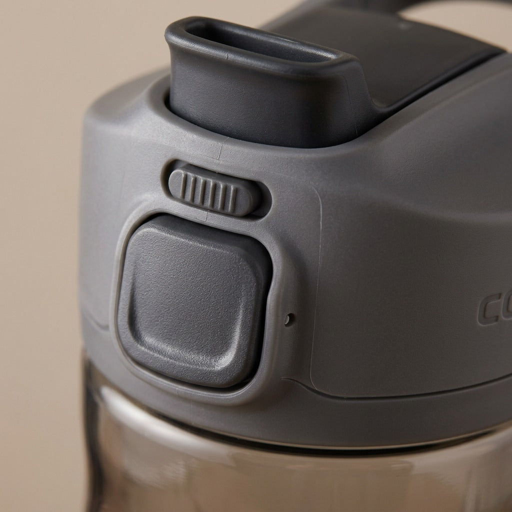 Close-up of the grey AUTOSEAL lid and push button on a Contigo Cortland 2.0 water bottle.