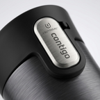 Macro view of the AUTOSEAL button on a black and grey Contigo travel mug, emphasizing its texture.
